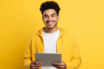 Young Person with a Tablet Computer in Hand