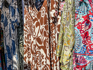 A well-known bazaar in the town of Zarki in Poland, colorful fabrics for sale