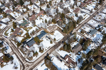Enjoy a mesmerizing drone view of Oro-Medonte, Port Severn, Midland, Victoria Harbour, Sturgeon Bay, Robins Point, Port McNicoll, and a frozen lake on a foggy winter day. The misty landscape creates a