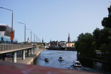 View of river in city against clear sky
