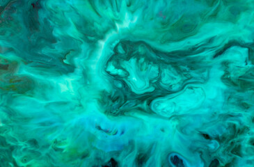 Closeup abstract color mixing of acrylic for use as background. Acrylic texture with marble pattern, green marbling background 