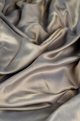part of the fabric from beige-colored clothing