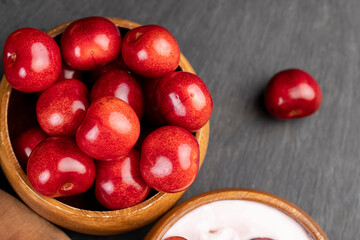 fresh yogurt with cherry flavor and whole juicy cherry berries