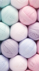 A pile of balls of yarn sitting next to each other