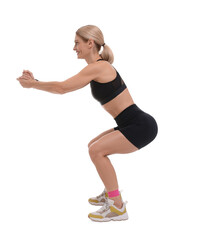 Fototapeta na wymiar Woman exercising with elastic resistance band on white background