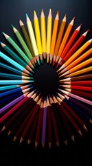 A rainbow of colored pencils arranged in a circle