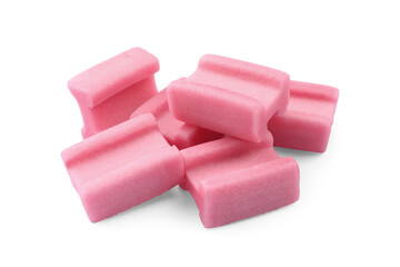 Many tasty pink chewing gums on white background