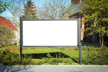 Empty signboard outdoors on sunny day. Mock-up for design