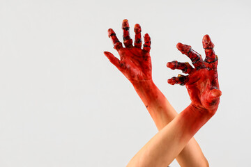 Bloodstained zombie hands on white background. Halloween celebration