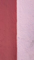 Bright colored textured painted wall in Oaxaca, Mexico