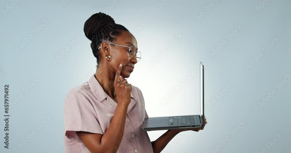 Wall mural Laptop, smile and thinking with a black woman user in studio on a gray background for internet research. Portrait, computer and inspiration with a happy young person brainstorming an idea online