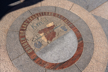 Plaque on the sidewalk marking kilometer zero of the national highways in the Puerta del Sol square...