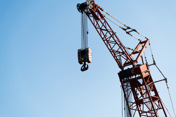 Naklejka premium Looking crane working from below