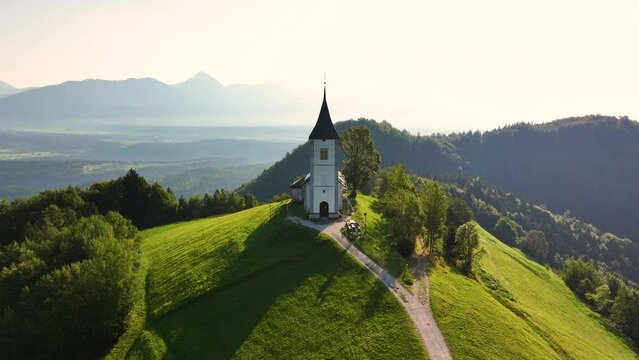 St. Primoz Church, Jamnik aerial perspective on a summer morning, Slovenia, Europe