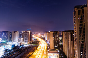 Fototapeta na wymiar Modern skyscrapers in the city at dusk
