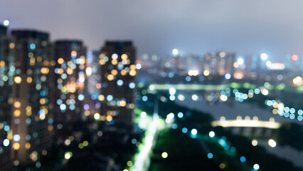 Defocused blur of city buildings at night