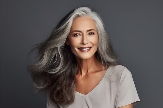 fair skin woman with smooth healthy face skin. Beautiful aging mature woman with long gray hair and happy smiling, beauty and cosmetics advertising concept, created with Generative AI
