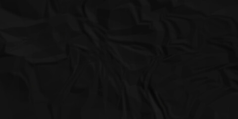 Crumpled paper texture. black crumpled paper texture. top view. crush paper so that it becomes creased and wrinkled. Old black crumpled paper sheet background texture.
