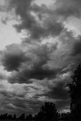 black and white thunderstorm clouds above