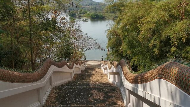 Steps Leading Down to Phu Sai Lake in Phetchaburi, Thailand in front of Wat Wang Phu Sai Kuti Temple.