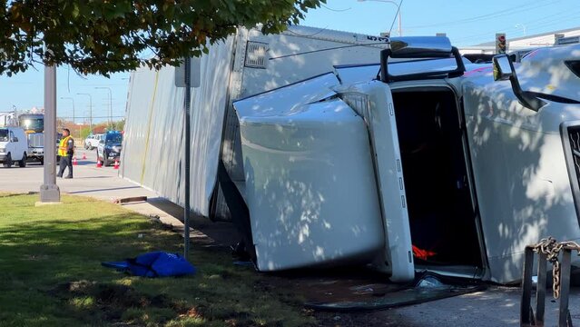 Close up shot of road accident with overturned truck blocking traffic. Naperville. IL. USA , November 15, 2022.