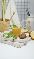a herbal drink, ginger and lemon tea.  Healthy concept