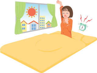 起床　あくび　若い女性　布団
