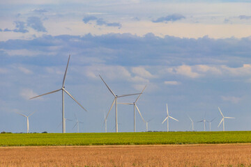Wind turbines in a field. Renewable energy