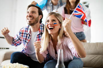Excited fans of soccer friends celebrating winning match