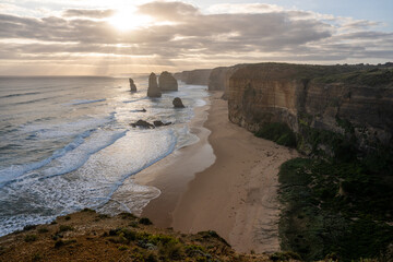 Marvel at the rugged beauty of the Australian coastline at the 12 Apostles, where dramatic rock formations meet the endless blue sea, a must-see destination for coastal enthusiasts and travelers.