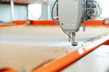 Automatic industrial sewing machine for stitching fabric