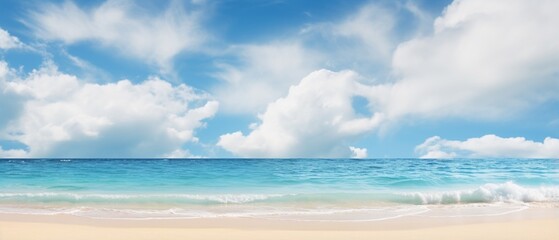 Obraz premium Blurred Tropical Beach Paradise: Golden Sand, Turquoise Ocean, and Blue Sky