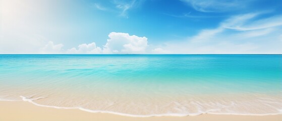 Obraz premium Blurred Tropical Beach Paradise: Golden Sand, Turquoise Ocean, and Blue Sky