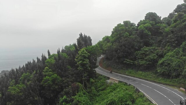 Heavy traffic at Hai van pass Vietnam during cloudy day, aerial