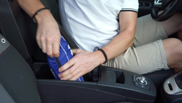 driver opens car first aid kit