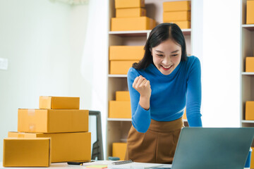 Asian woman people tackling warehouse tasks with dedication, realities of small web business management, e-commerce , dynamic world of small online business operations, efficient inventory management