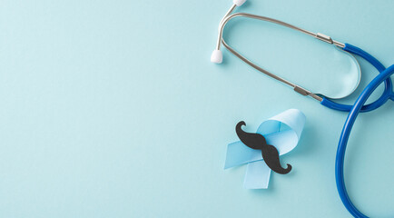 Support men's health month with a composition of blue ribbon, mustache silhouette, and a stethoscope for preventative health checks on a soft blue background, leaving space for text or advertisements