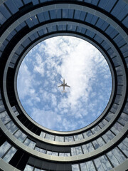 Airplane over the building