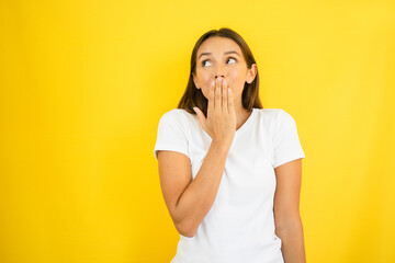 Woman Holding a Secret Looking Happy Copy Space
