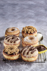 Assorted donuts with chocolate frosted, Mix donuts.