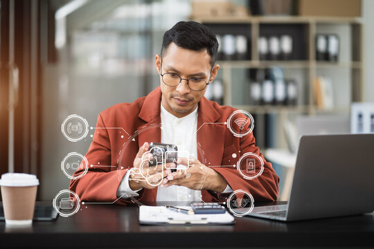 AI or Artificial Intelligence technology. Businessman using a smartphone and laptop computer chatting with an intelligent artificial intelligence. Futuristic technology, automate Chat Bot, Smart Ai.