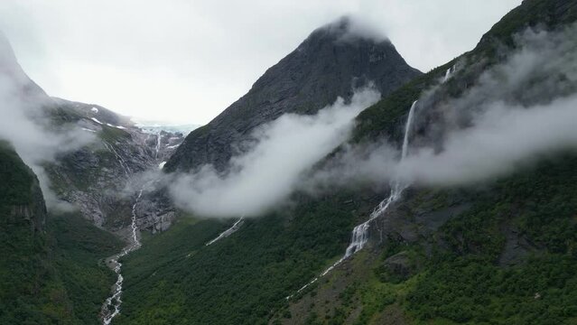 Briksdal Glacier (part of Jostedalsbreen) and Waterfall in Olden, Stryn, Briksdalen, Norway - Aerial