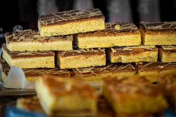 Millionaires shortbread displayed on a stall, with selective focus