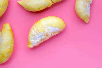 Durian on pink background. Copy space