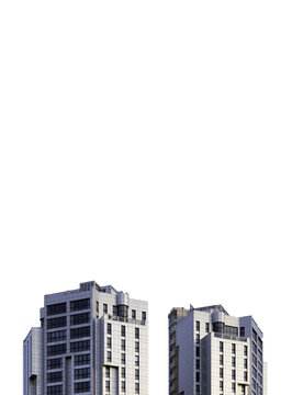 Front view of the top of two tall residential towers with blue sky and copy space. Achitecture concept