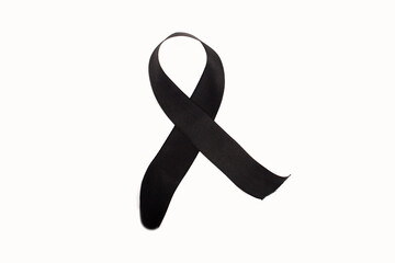 photo of black ribbon, ribbon for mourning on a white background