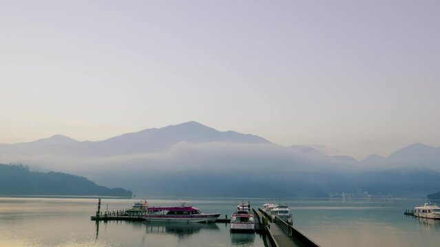 Early morning lake and mountain views. The clouds and mist are changing. The mountain and lake scenery of Sun Moon Lake in the morning. Nantou, Taiwan