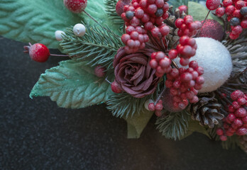 red rose and berries on leaves decor