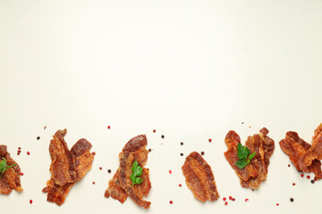 Tasty breakfast and delicious meat food concept - fried bacon
