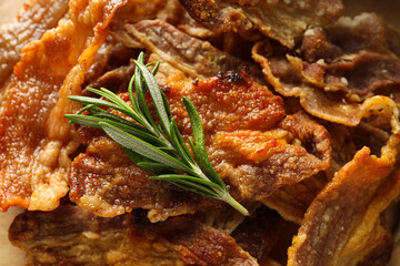 Tasty breakfast and delicious meat food concept - fried bacon